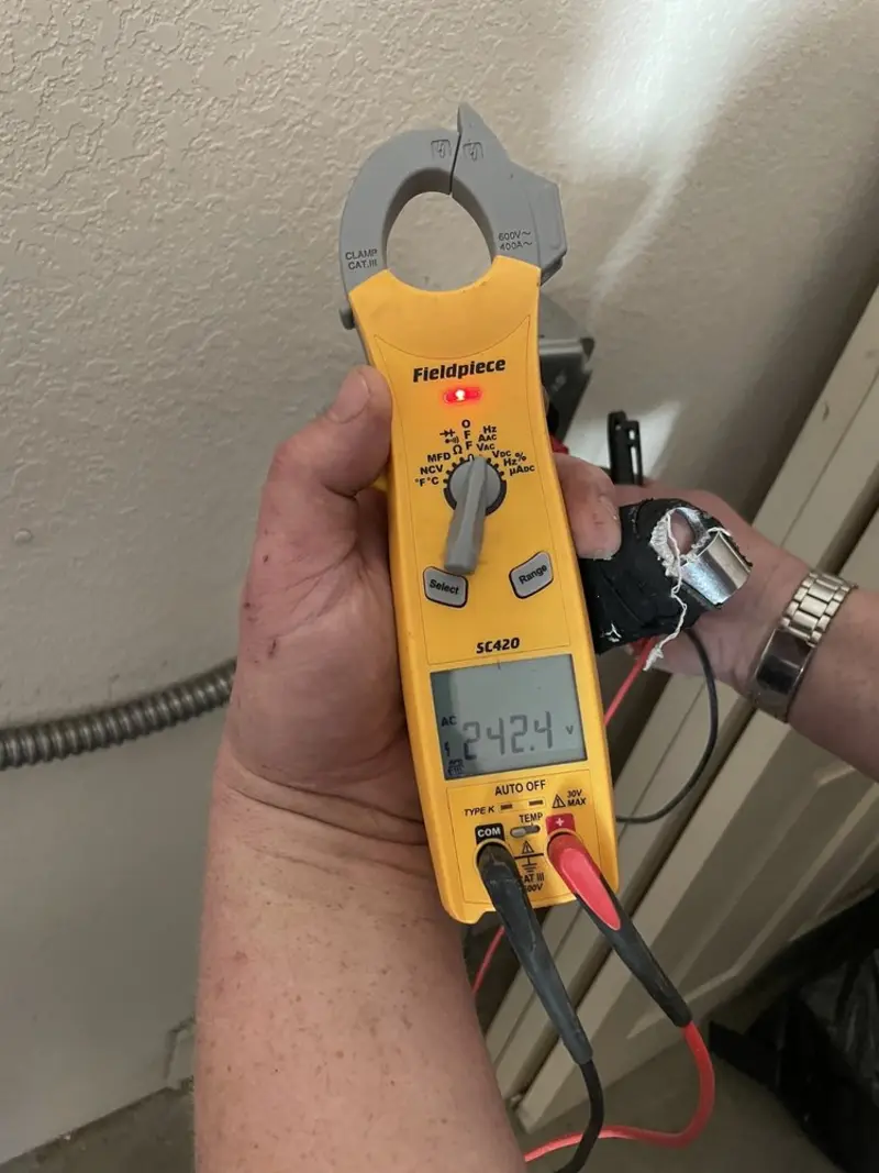 Voltage testing with clamp meter during Generator Installation in Lowville